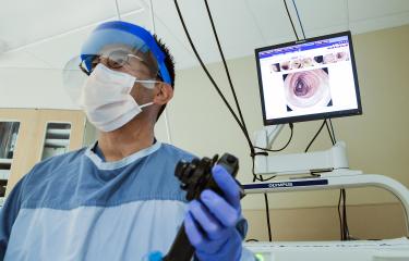 Doctor holding colonoscopy tool
